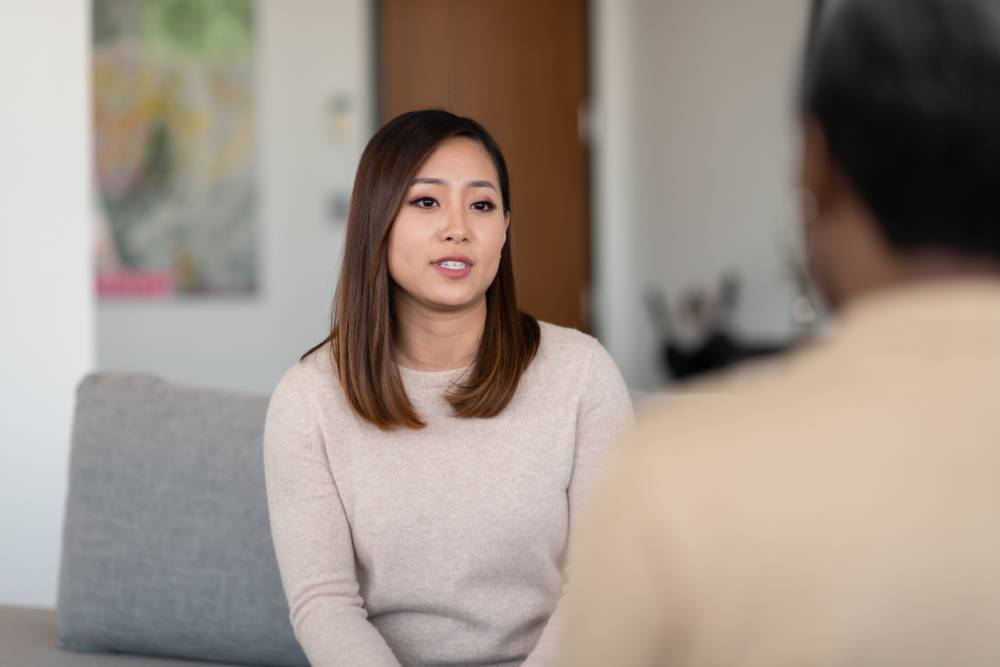 Woman speaking with a mental health expert
